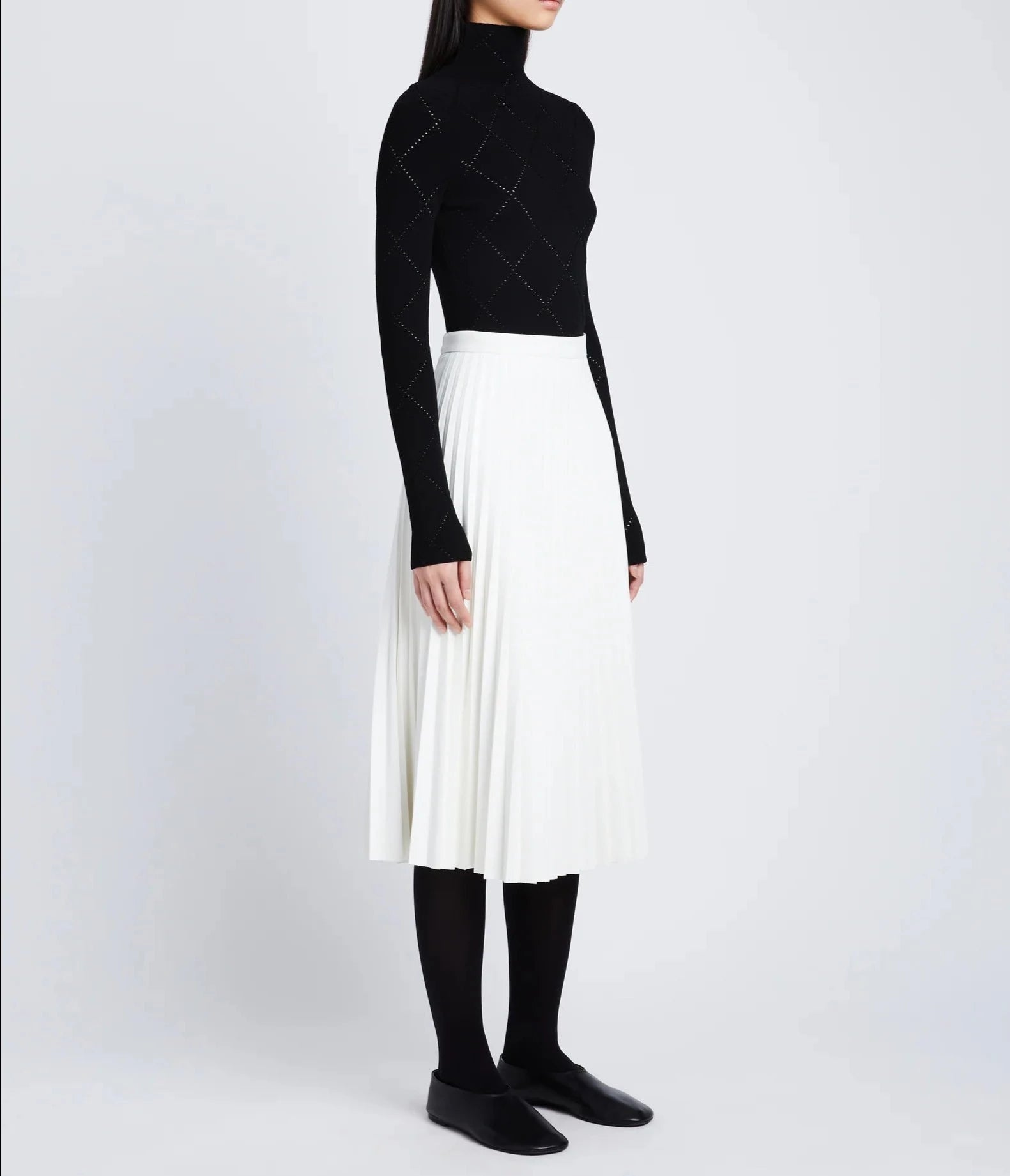 DAPHNE PLEATED SKIRT IN FAUX LEATHER