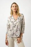 HAMMERED SATIN ABSTRACT FACE PRINT BOXY TOP
