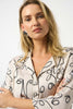HAMMERED SATIN ABSTRACT FACE PRINT BOXY TOP