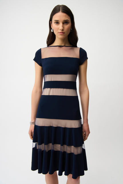 SILKY KNIT FIT AND FLARE DRESS WITH MESH INSERTS