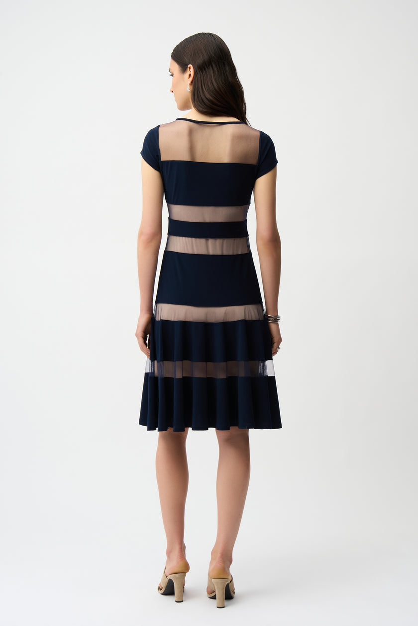 SILKY KNIT FIT AND FLARE DRESS WITH MESH INSERTS
