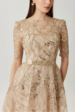 SEQUIN EMBROIDERED TULLE THREE QUARTER SLEEVE GOWN