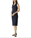 Woman wearing a navy blue dress on a white background