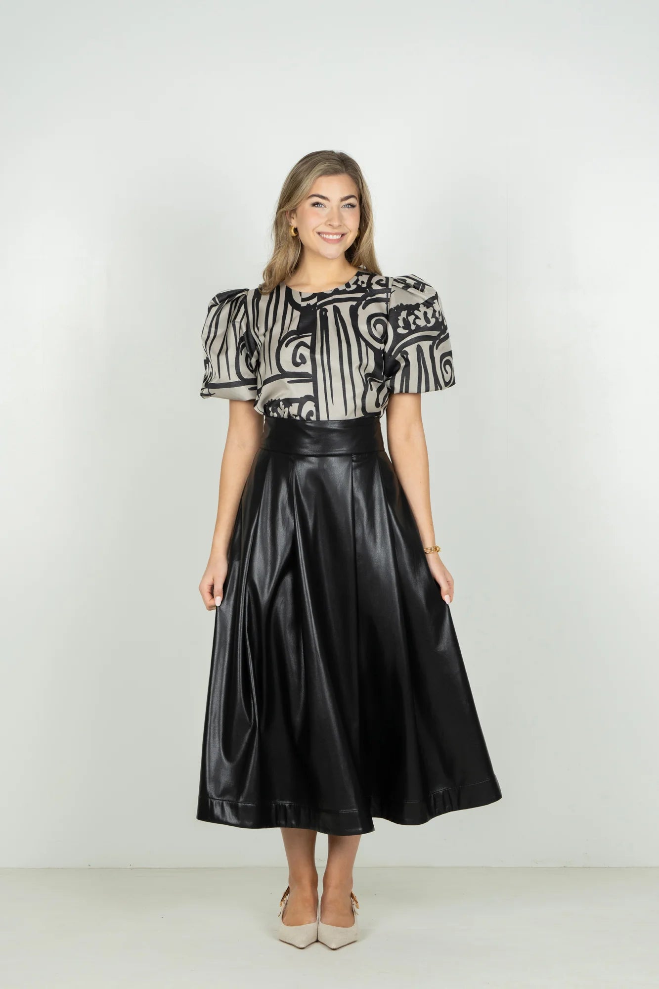 DOTTY SKIRT IN BLACK FAUX LEATHER