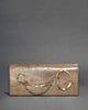 TWISTED GOLD SIDE HANDLE CLUTCH