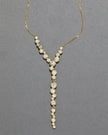 ASTERALES GOLD CASCADING NECKLACE