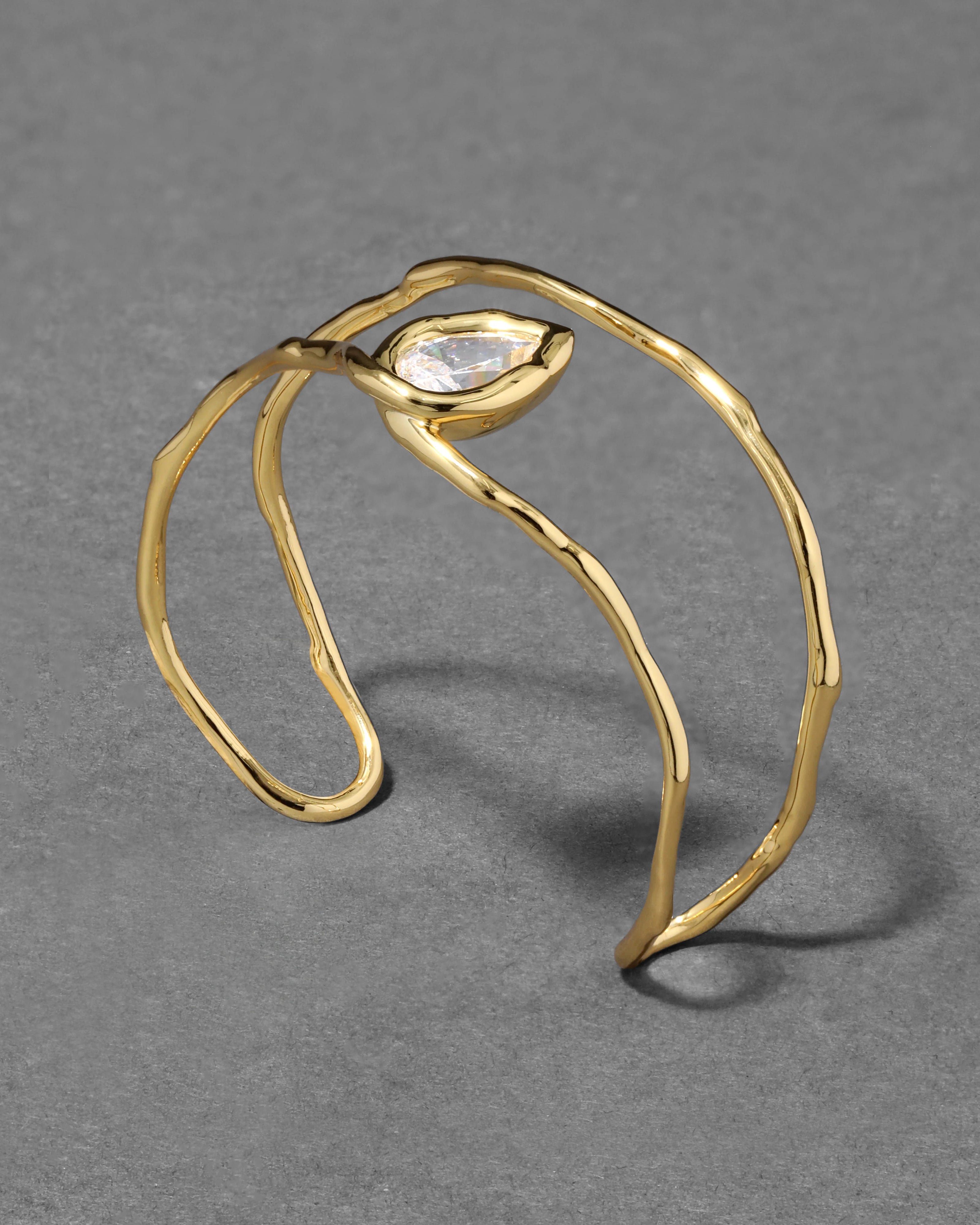 ASTERALES GOLD FLOATING CUFF BRACELET