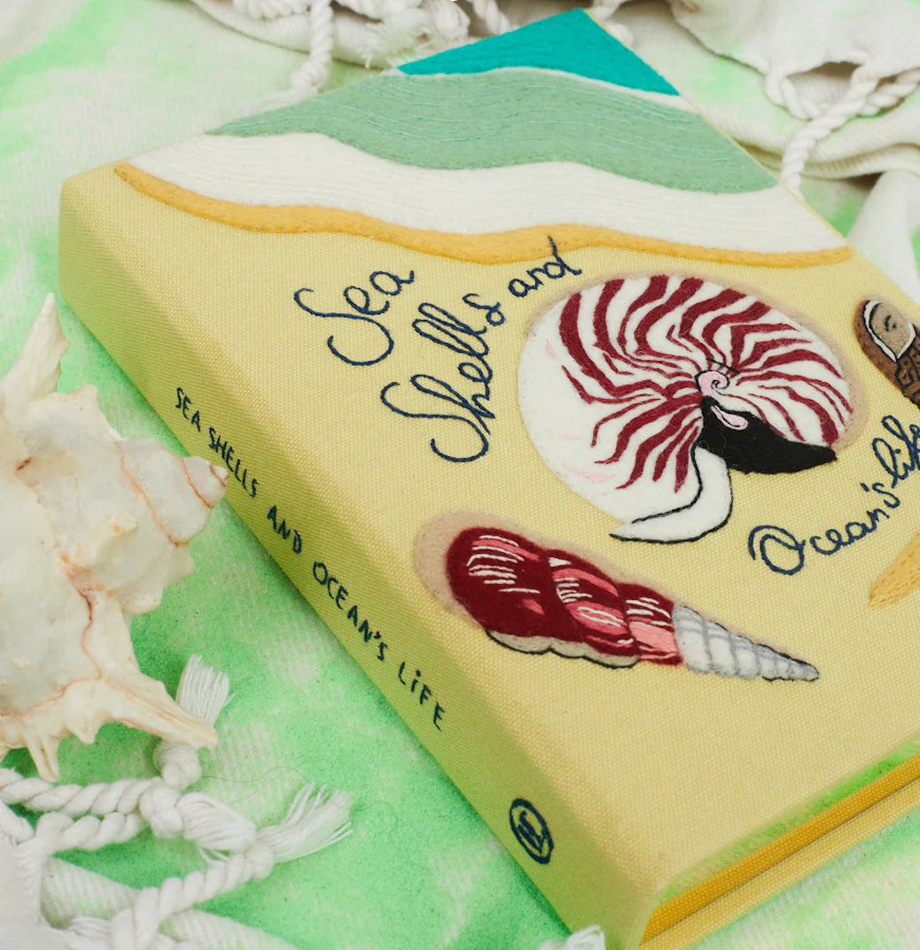 SEA SHELLS AND OCEANS LIFE BOOK CLUTCH