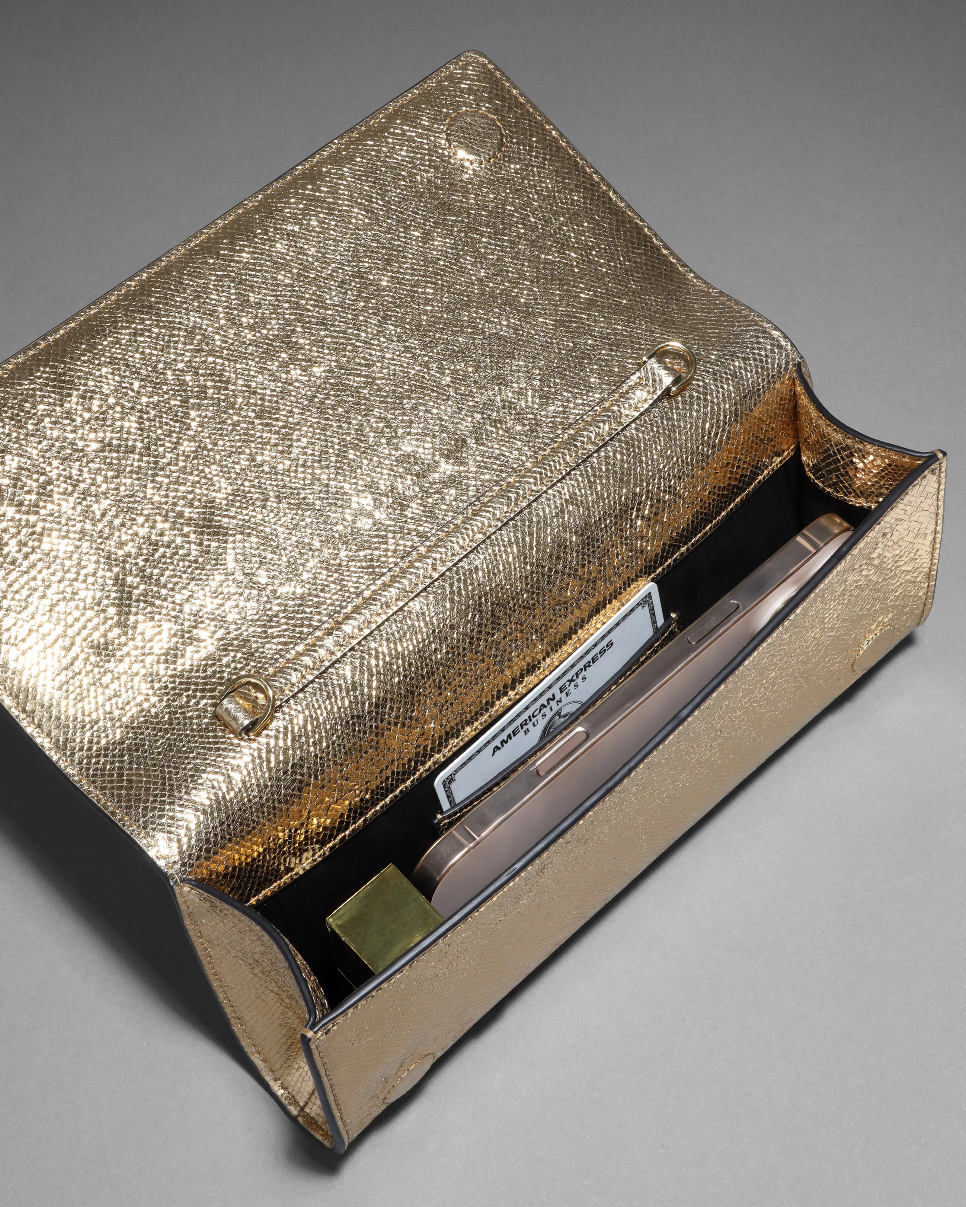CRYSTAL CURVE CLUTCH