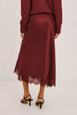 EBONY SKIRT IN CRIMSON