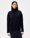 GROWN ON TURTLENECK