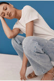 LEXI MID RISE BOWED STRAIGHT JEAN IN STELLAR