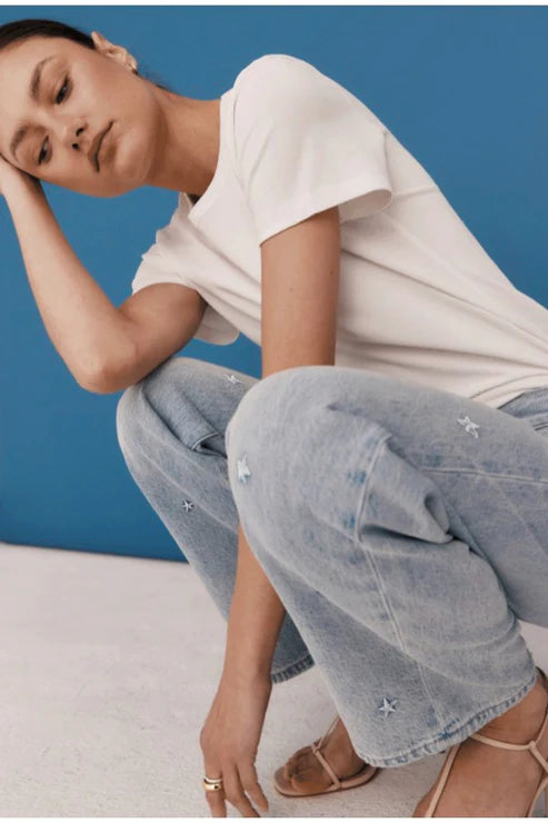 LEXI MID RISE BOWED STRAIGHT JEAN IN STELLAR