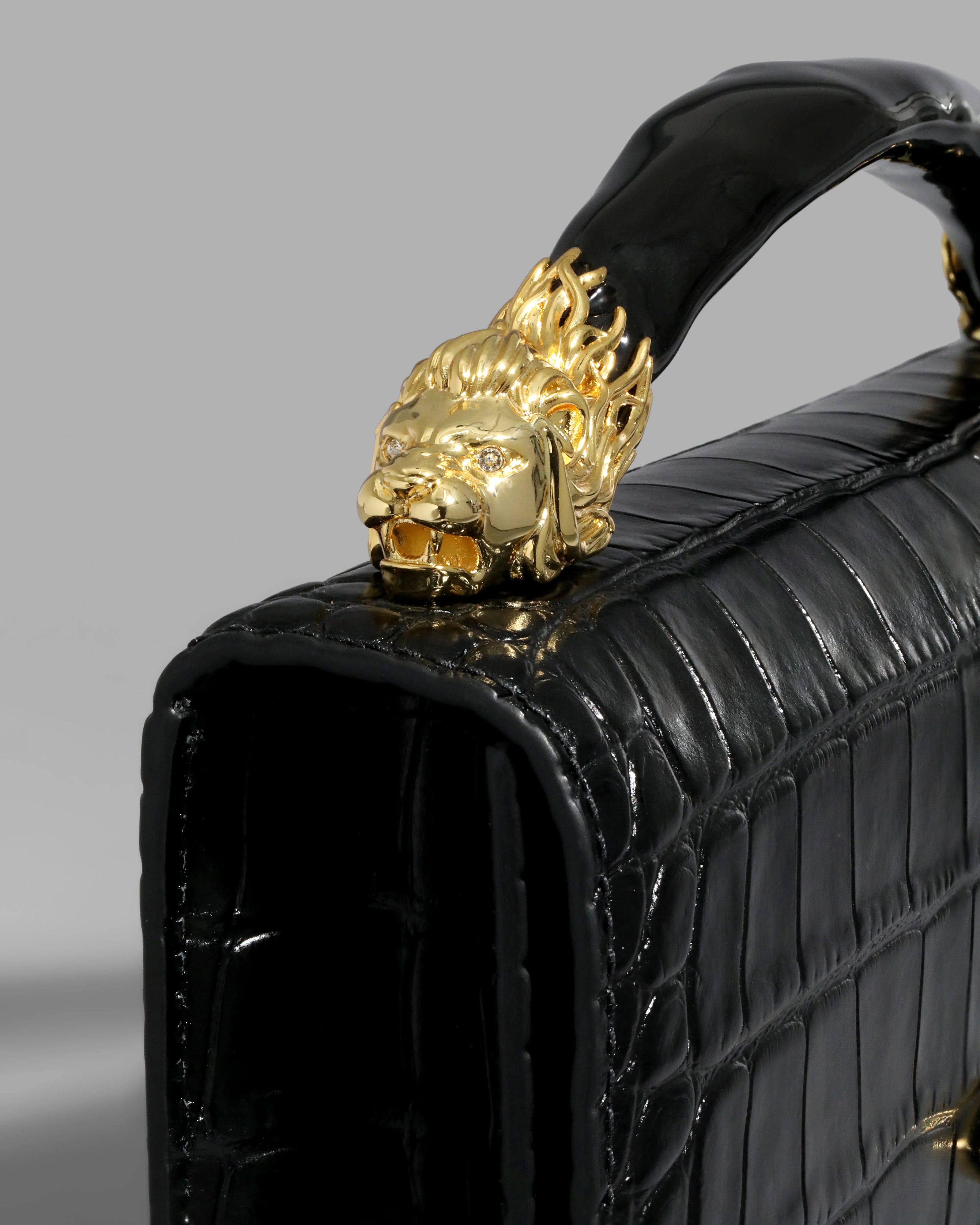 LIONESS TOP HANDLE CLUTCH