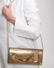 TWISTED GOLD SIDE HANDLE CLUTCH