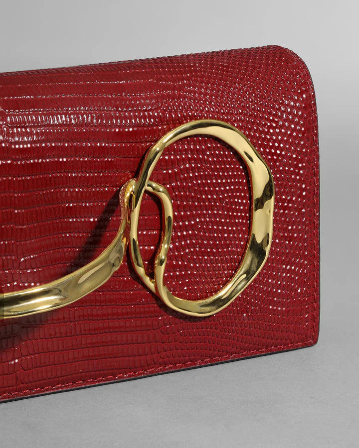 TWISTED GOLD SIDE HANDLE CLUTCH PURSE BURNT CHERRY