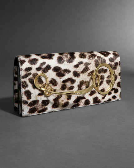 TWISTED GOLD SIDE HANDLE CLUTCH PURSE IN METALLIC LEOPARD