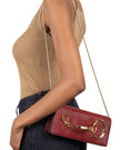 TWISTED GOLD SIDE HANDLE CLUTCH PURSE BURNT CHERRY