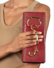 TWISTED GOLD SIDE HANDLE CLUTCH PURSE BURNT CHERRY