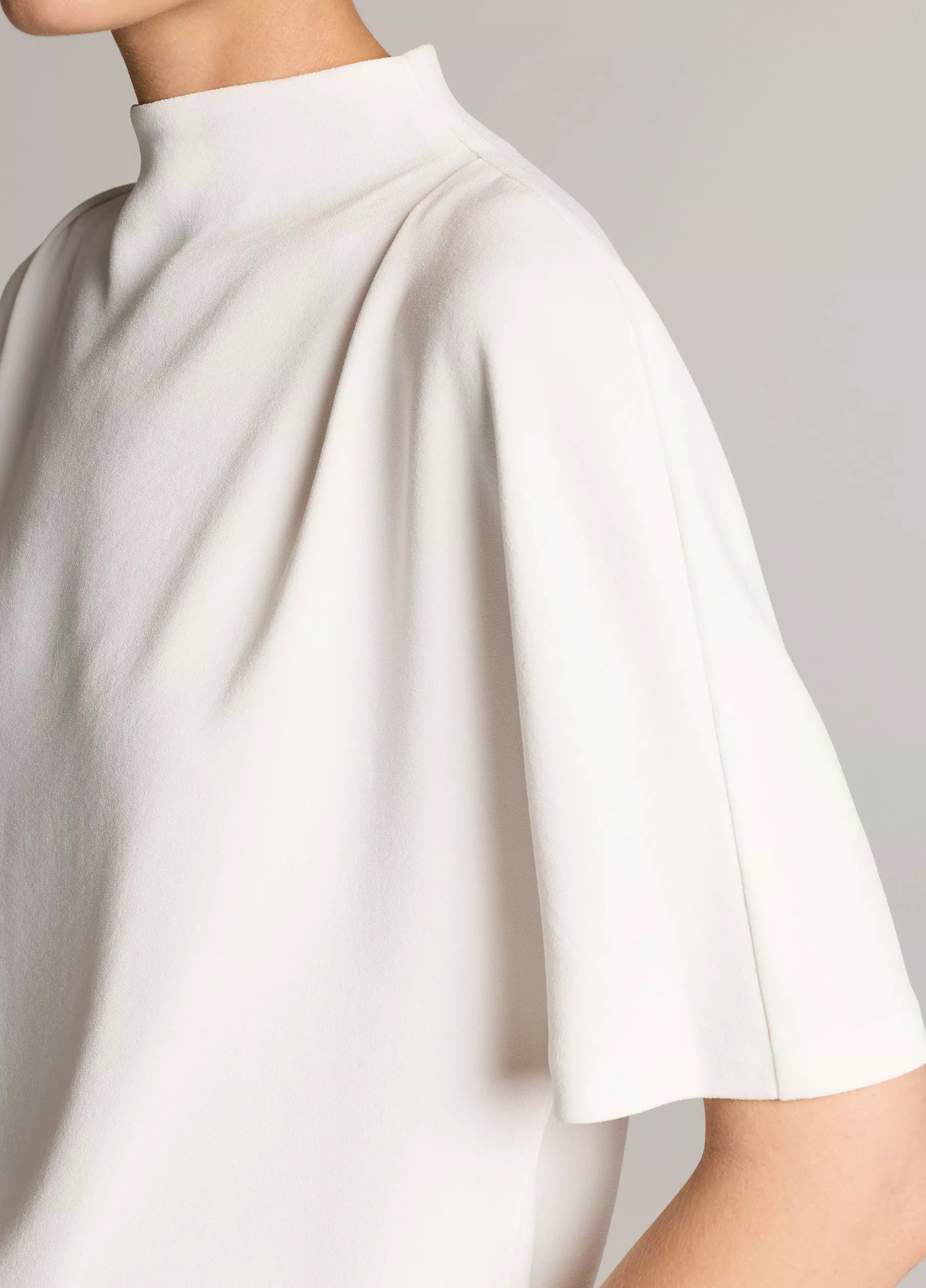 DRAPED CREPE FUNNEL NECK TOP IN OFF WHITE