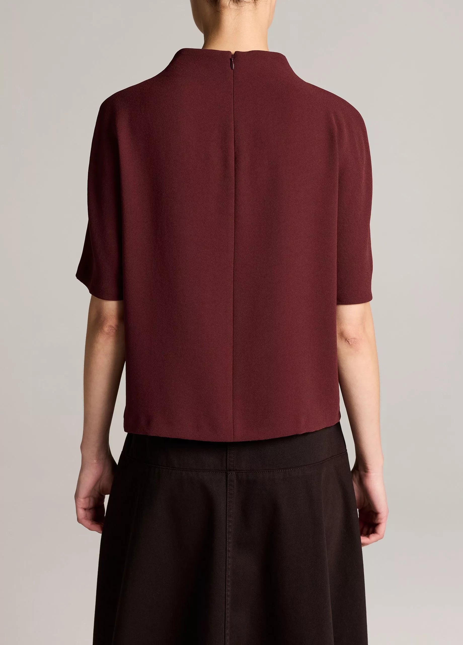 DRAPED CREPE FUNNEL NECK TOP IN BLACK ROSE