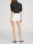 THE GILLIAN TOP IN BLACK MULTI POLKA DOTS