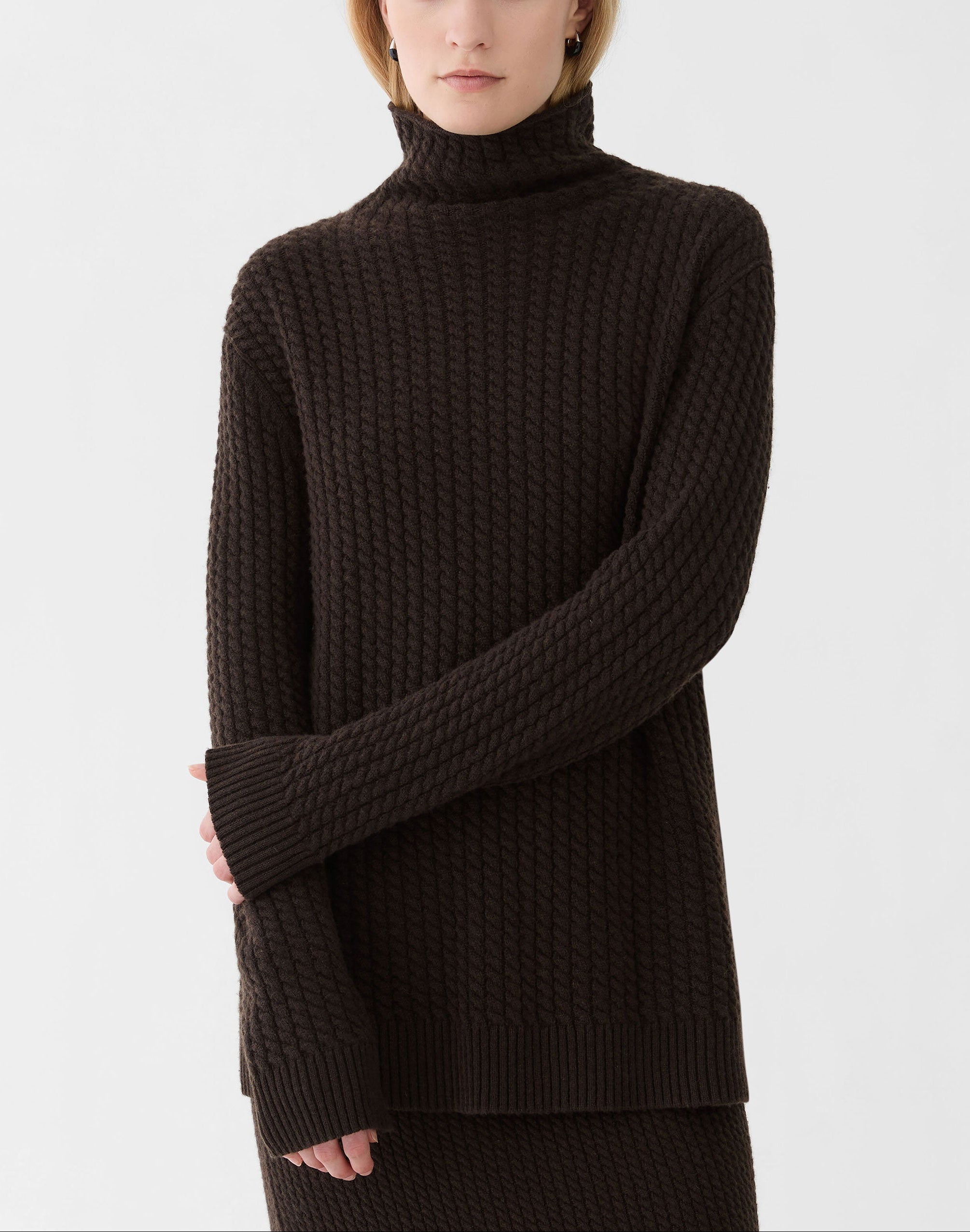 CABLED STAND COLLAR SWEATER