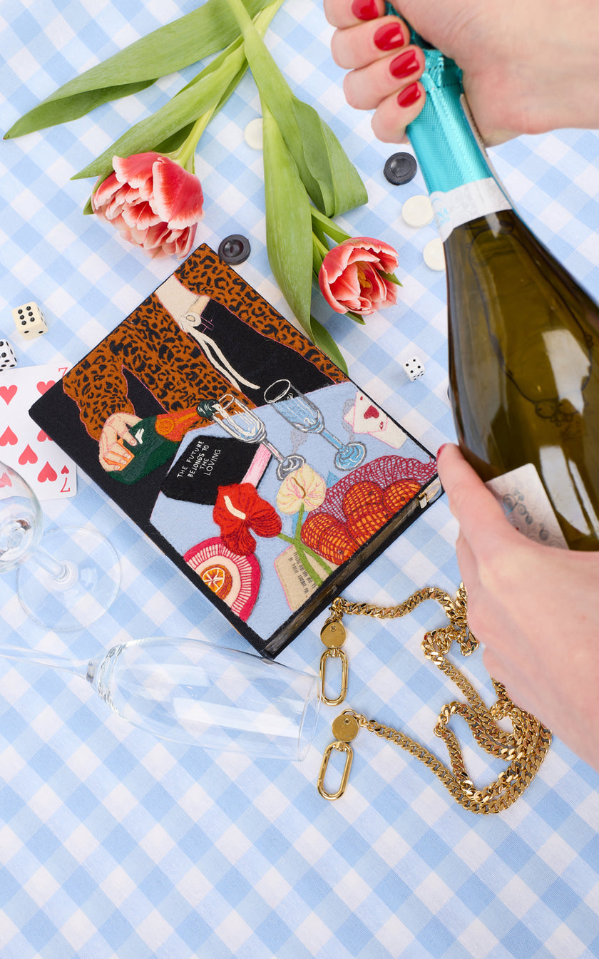 THE LOVING BOOK CLUTCH STRAPPED